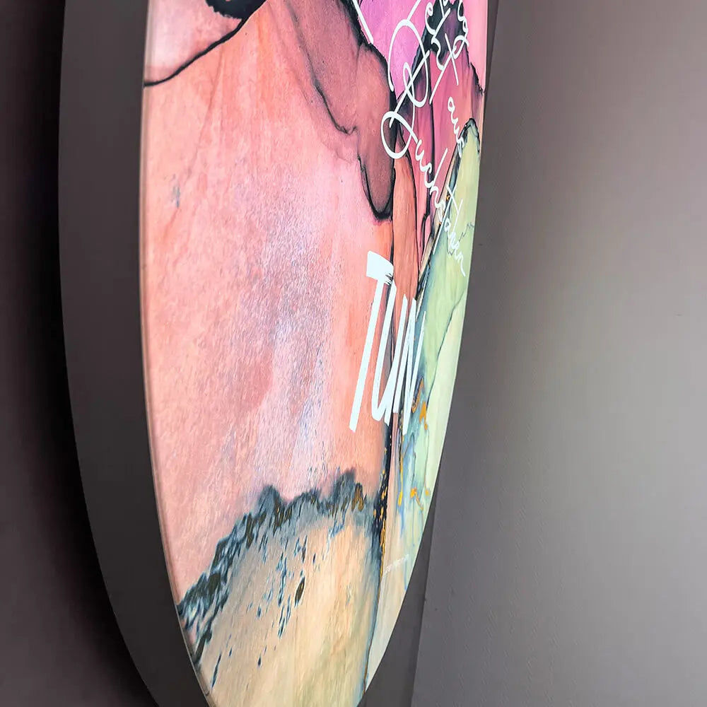 Close-up of the illuminated round LED wall frame