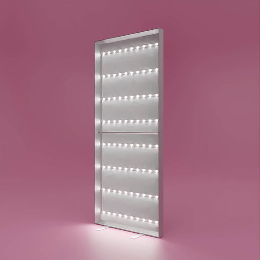 Beleuchteter PIXLIP POP Rahmen auf rosa Hintergrund ohne textildruck – freistehend mit LED-Licht für hinterleuchtete Werbegrafiken.