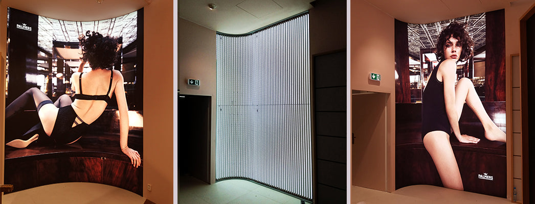 Gebogene Lichtwand auf Maß genau angepasst für ein Geschäft